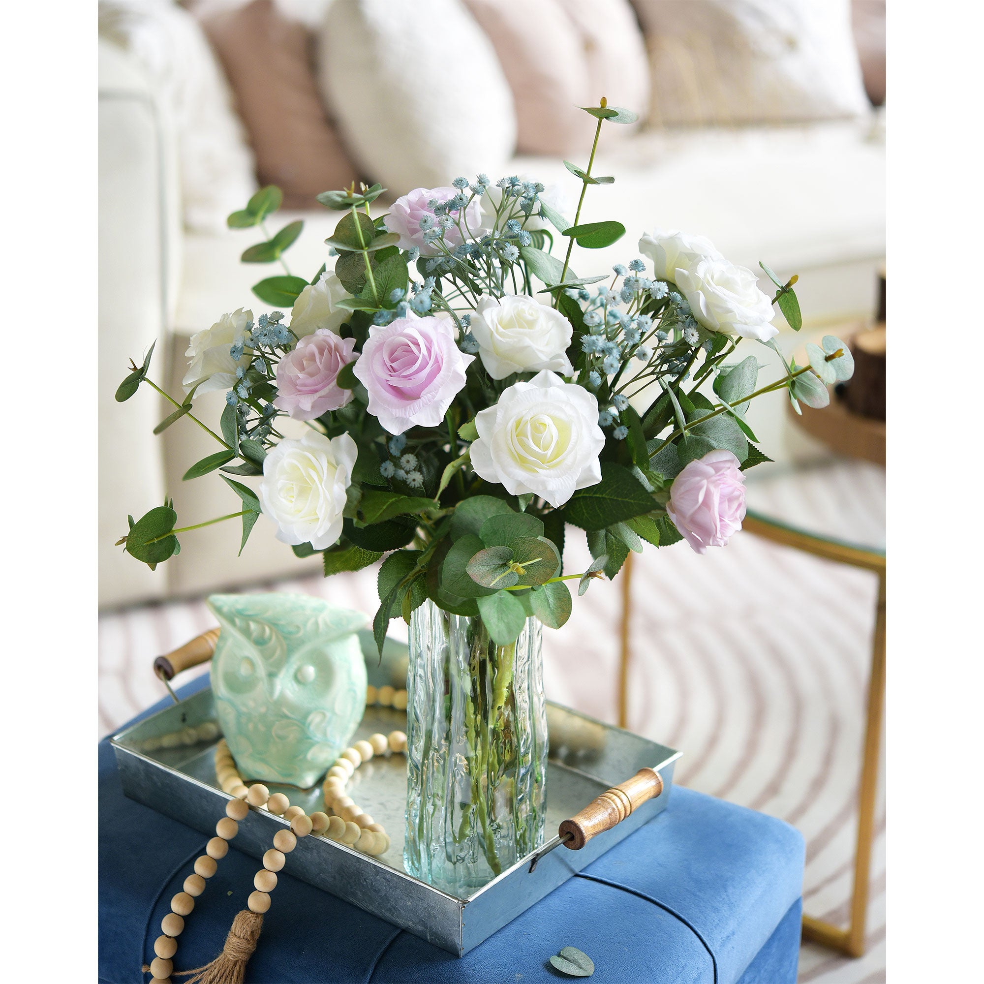 Blue jug vase with bulk gypsophila dried white flowers Stock Photo by  Frostroomhead