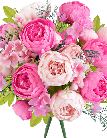 Artificial peony bouquet featuring hot pink and blush peonies with soft greenery and realistic textures, perfect for weddings or home decor.