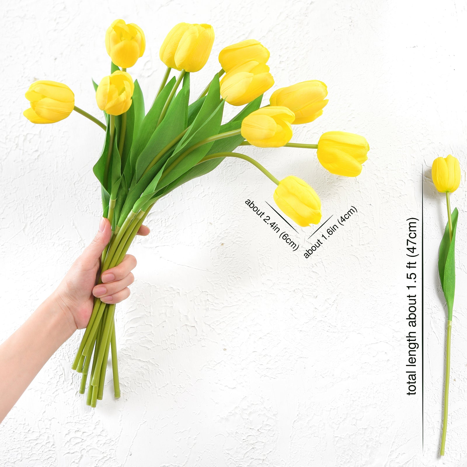 Hand holding a vibrant bouquet of artificial yellow tulips, with detailed measurements for total length and bloom size.