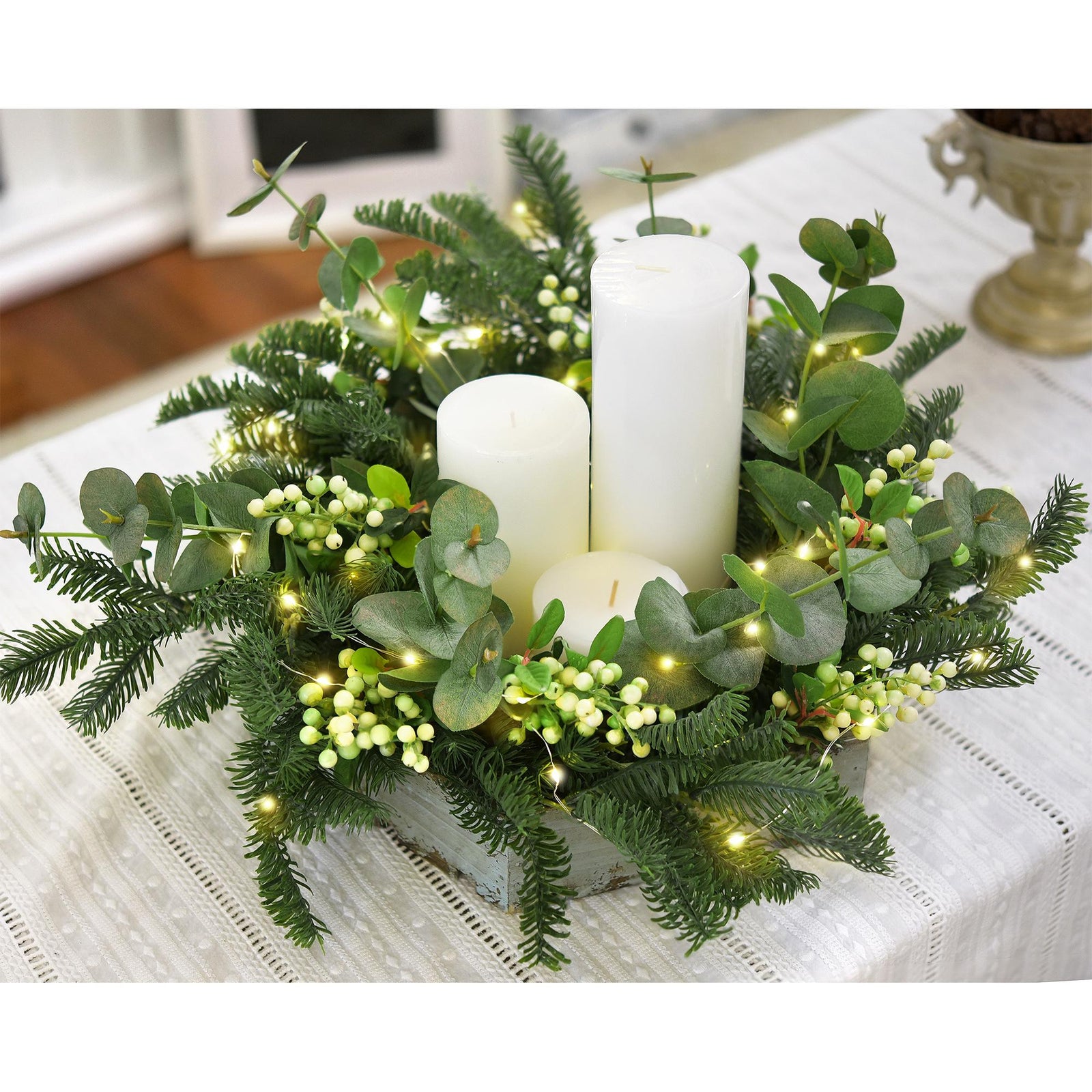 Decorative holiday wreath made from soft-touch faux pine with berries and pinecones