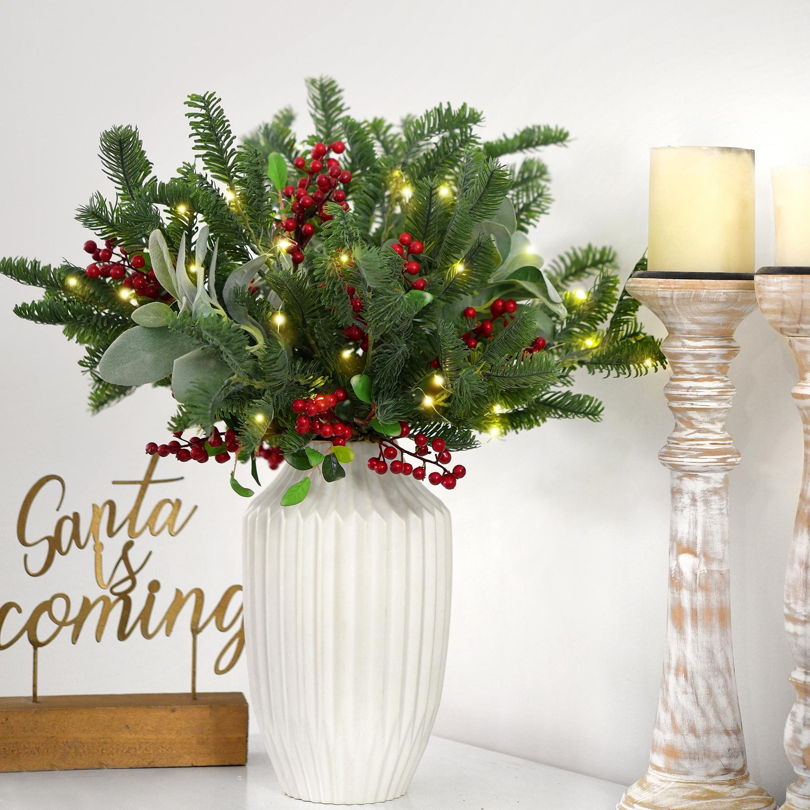 Soft-touch faux pine stems with red berries for creating rustic holiday arrangements