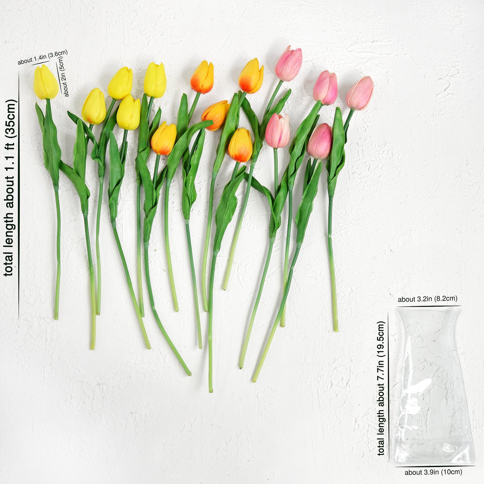 Fifteen real-touch artificial tulip stems in vibrant orange, yellow, and pink shades displayed flat on a white background. Each tulip is approximately 13.6 inches (35 cm) in length. Includes a foldable PVC vase measuring about 7.7 inches (19.5 cm) in height and 3.9 inches (10 cm) in width.

