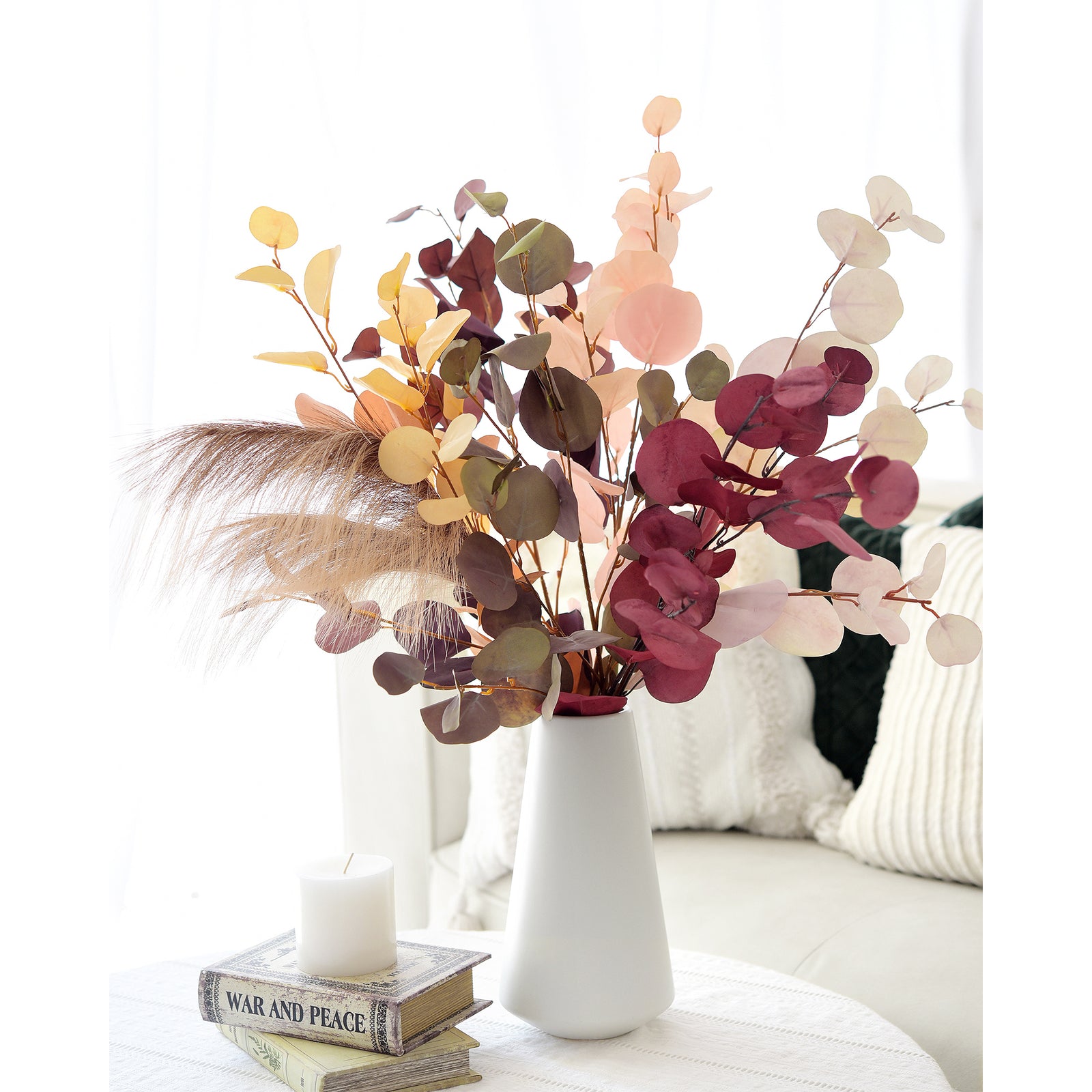 Silk eucalyptus stems in Dusky Ember, Burgundy, and Warm Taupe arranged in a vase, perfect for elegant home decor