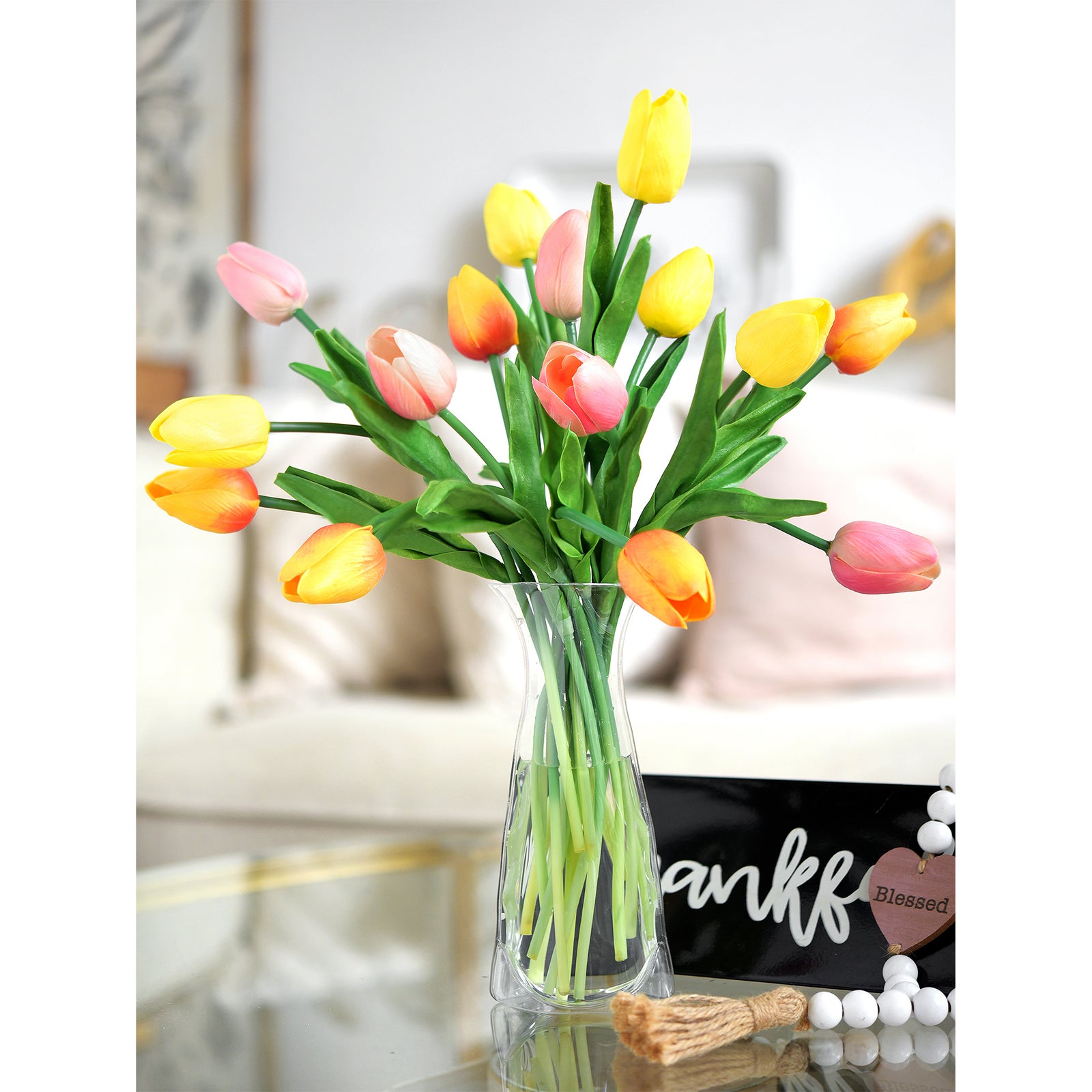 Real-touch tulips arranged as a centerpiece in a bright room, blending effortlessly into home décor.
