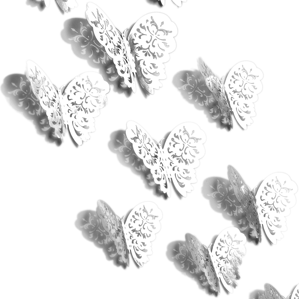 Couples of silver metallic butterflies with white background. 