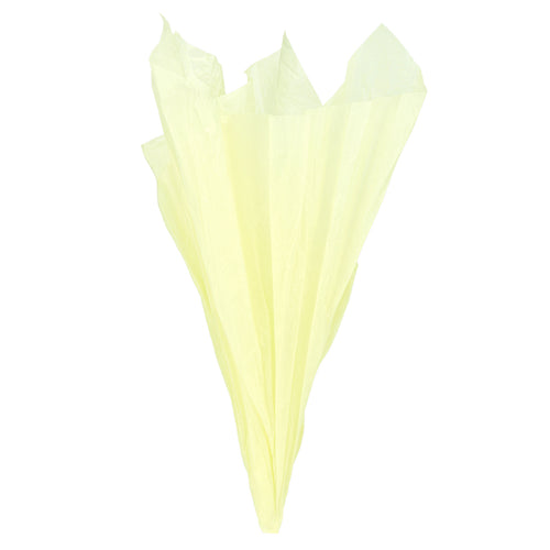 Displaying of a light yellow tissue paper in ice cream cone shape